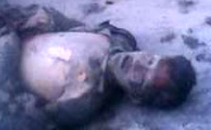 Yangdang, who fell on the ground, badly burnt, after his self-immolation.