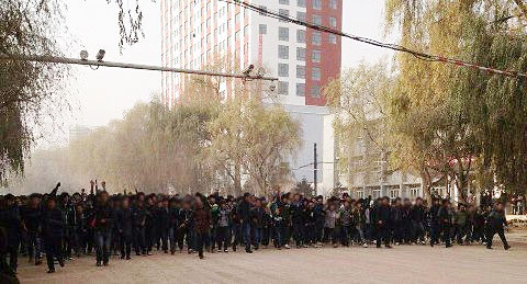Schoolchildren and students demonstrate
