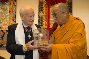 His Holiness the Dalai Lama presenting Robert Ford with ICT's Light of Truth Award in April 2013.