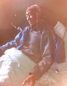 An injured Tibetan following the assault in hospital, image circulated on social media.