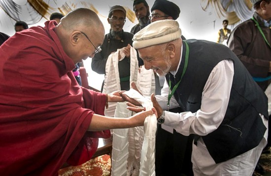 Dalai Lama being offered a khata