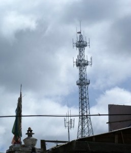 Tibetan national flag flying atop a cell-phone mast