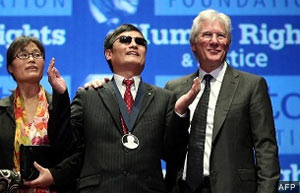 Chen Guangcheng, with his wife Yuan Weijing and ICT Board Chair Richard Gere